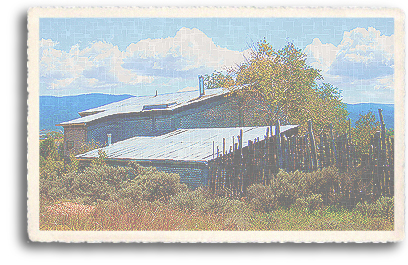 A rustic adobe house north of Taos, New Mexico, that incorporates the bottoms of glass bottles into the construction as part of a passive solar treatment.