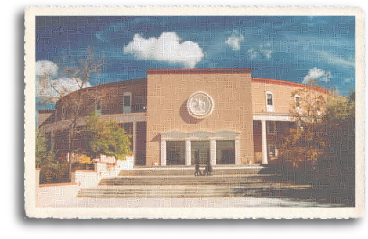 The New Mexico State Capitol building is an outstanding example of a more modern approach to traditional adobe architecture. Commonly referred to as the “Roundhouse” by locals, due to its circular design, this official government structure is located in the heart of downtown Santa Fe, New Mexico.